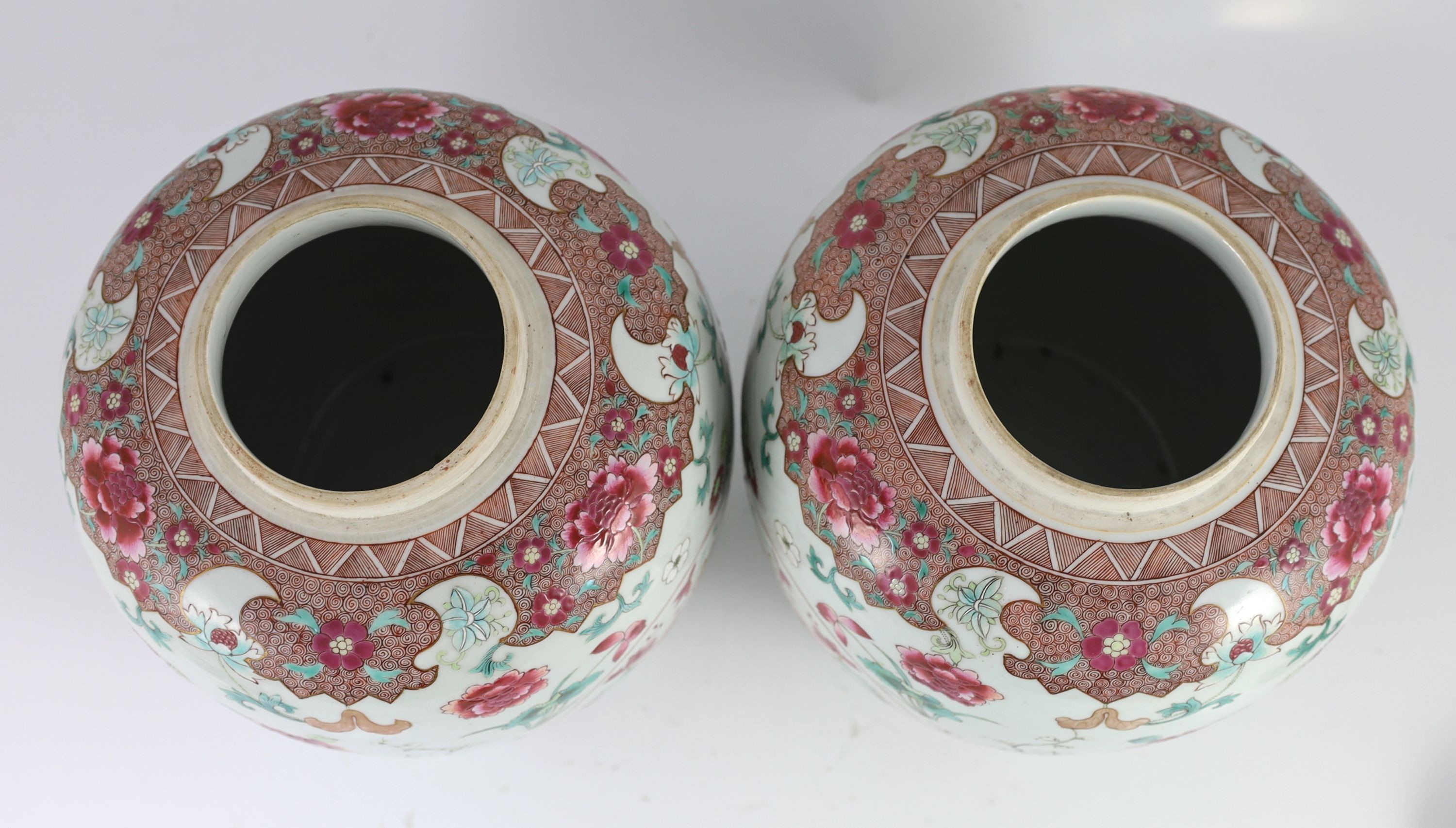 A good pair of Chinese famille rose ovoid jars and covers, 19th century, 28.5 cm high